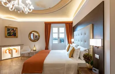 Letto o letti in una camera di Kairos by Florence Art Apartments