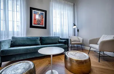 Area soggiorno di Hs4U Ricasoli Luxury apartment near Duomo N. 3