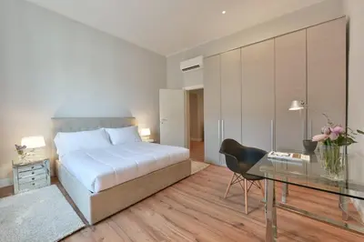 Letto o letti in una camera di Apartments Florence Santa Croce Terrace Deluxe