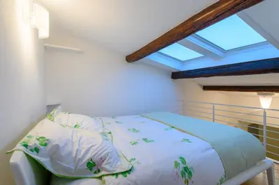 Letto o letti in una camera di Apartments Florence - San Lorenzo Market