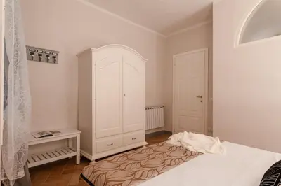 Letto o letti in una camera di Toscanella - Flo Apartments