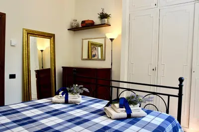 Letto o letti in una camera di Villa Porta Romana - Family country house in the heart of Florence
