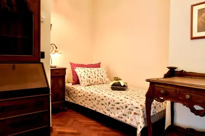 Letto o letti in una camera di Villa Porta Romana - Family country house in the heart of Florence