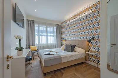 Letto o letti in una camera di Apartments Florence - Dreams Over Ponte Vecchio