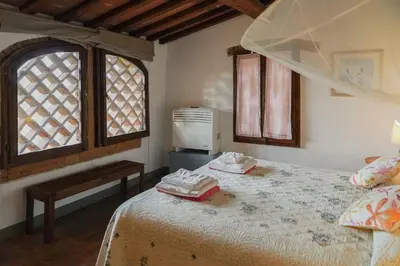 Letto o letti in una camera di Villa Casavecchia