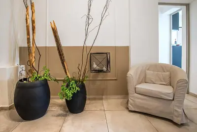 Area soggiorno di Penthouse with big terrace Duomo view