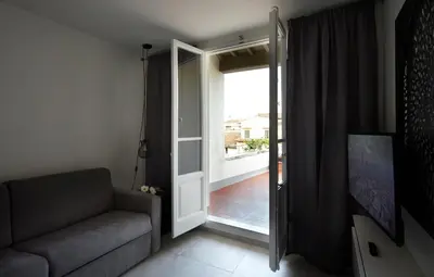 Area soggiorno di Penthouse with big terrace Duomo view