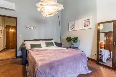 Letto o letti in una camera di Wine Apartments Florence Franciacorta