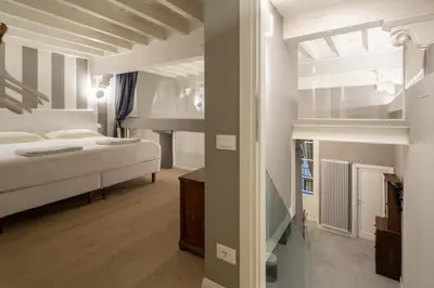 Letto o letti in una camera di Casa Velluti Deluxe by Mmega