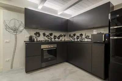 Cucina o angolo cottura di Casa Velluti Deluxe by Mmega