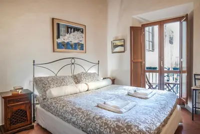 Letto o letti in una camera di FLOR MELERA