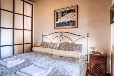 Letto o letti in una camera di FLOR MELERA