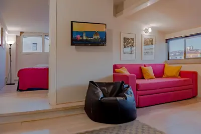 Area soggiorno di SKYLINE FLORENCE APARTMENT