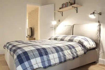 Letto o letti in una camera di Gilbe One Apartment by Mamo Florence
