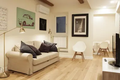 Area soggiorno di Gilbe One Apartment by Mamo Florence