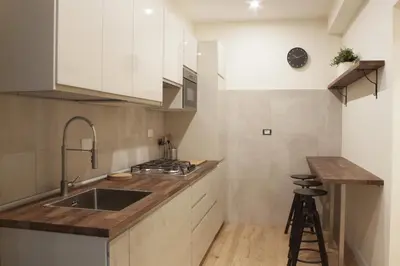 Cucina o angolo cottura di Gilbe One Apartment by Mamo Florence