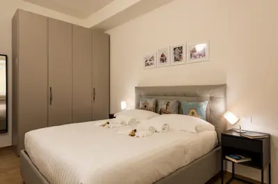 Letto o letti in una camera di Apartments Florence - Modern Signoria