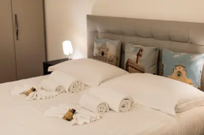 Letto o letti in una camera di Apartments Florence - Modern Signoria