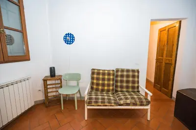 Area soggiorno di Roomy and elegant apartment by Piazza Pitti