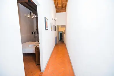 Letto o letti in una camera di Roomy and elegant apartment by Piazza Pitti
