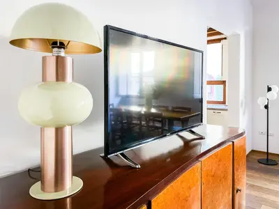 TV o dispositivi per l'intrattenimento presso Spacious apartment by Duomo