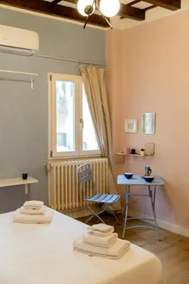 Letto o letti in una camera di Cute and charming suite