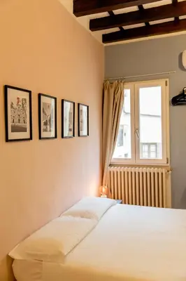Letto o letti in una camera di Cute and charming suite