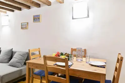 Area soggiorno di GuestHost - Giardino Bardini Cozy Apartment