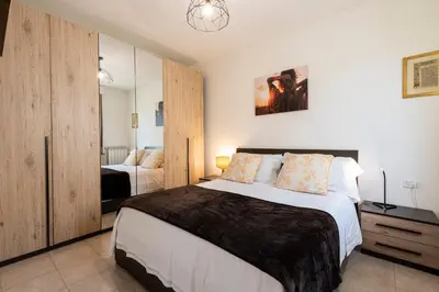 Letto o letti in una camera di Castelnuovo Flat with Elevator and Free Parking