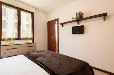 TV o dispositivi per l'intrattenimento presso Castelnuovo Flat with Elevator and Free Parking