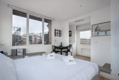 Letto o letti in una camera di LoveTheView 360° - LoveTheApartments