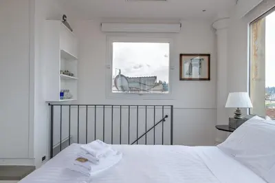 Letto o letti in una camera di LoveTheView 360° - LoveTheApartments