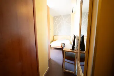 Letto o letti in una camera di Hotel Angelica Firenze