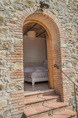 Letto o letti in una camera di La Magnolia