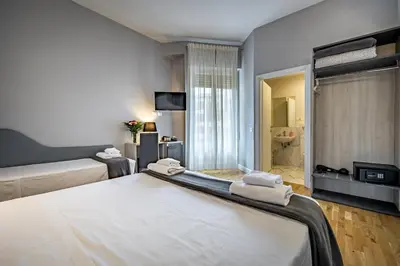 Letto o letti in una camera di Residenza24