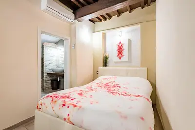 Letto o letti in una camera di BE YOUR HOME - Just a Step Away from Everything