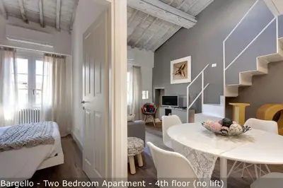 Letto o letti in una camera di St Elizabeth Loft Apartments by Mamo Florence