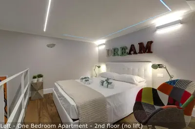 Letto o letti in una camera di St Elizabeth Loft Apartments by Mamo Florence