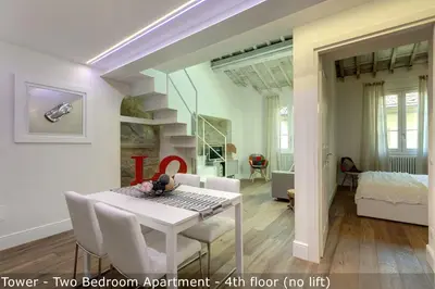 Letto o letti in una camera di St Elizabeth Loft Apartments by Mamo Florence