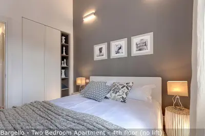 Letto o letti in una camera di St Elizabeth Loft Apartments by Mamo Florence