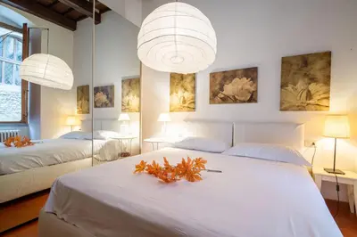 Letto o letti in una camera di Uffizi Place by Mmega