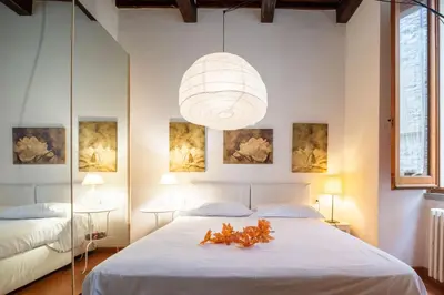 Letto o letti in una camera di Uffizi Place by Mmega