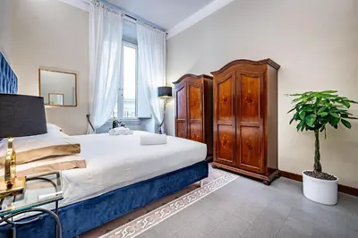 Letto o letti in una camera di THREE APARTMENTS Via Roma