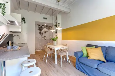 Area soggiorno di Ricasoli Apartment by Mamo Florence