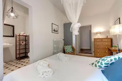 Letto o letti in una camera di Nori Apartment by Mamo Florence