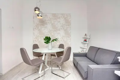 Area soggiorno di Velluti Apartment by Mamo Florence