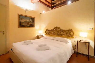 Letto o letti in una camera di Oltrarno Apartment