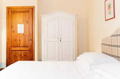 Letto o letti in una camera di Casa Uffizi XIII Century Tower House Boutique Hotel