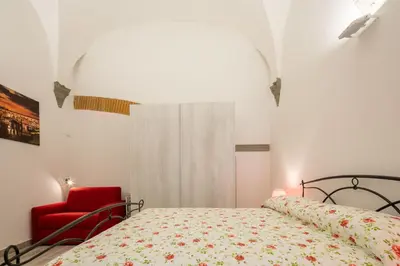 Letto o letti in una camera di Le Volte by Mmega