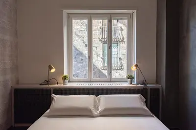 Letto o letti in una camera di PONTE VECCHIO LUXURY AND STYLISH APARTMENT